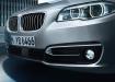BMW 5 series в деталях: фары, решётка радиатора, бампера - вид спереди