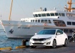 Kia Optima на фоне теплохода