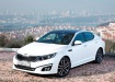 Kia Optima на фоне города