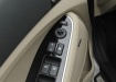 Kia Optima - кнопки на двери