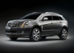 Cadillac SRX на чёрном фоне