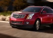 Cadillac SRX - красный в движении