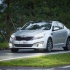 Kia Optima - вид спереди в движении