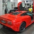 Bugatti EB 110 в красном цвете в шоу-руме автосалона