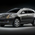 Cadillac SRX на чёрном фоне